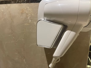 Hair dryer, slippers, towels