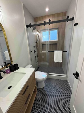 Shower, hair dryer, towels, soap