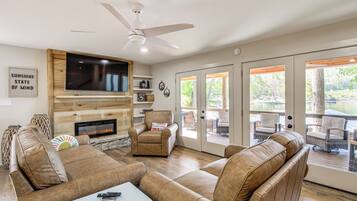 TV, fireplace, books