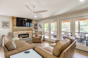 TV, fireplace, books