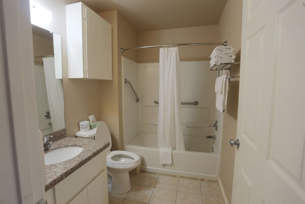 Hair dryer, towels, soap, toilet paper