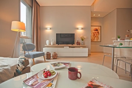 Apartment, 1 Double Bed, Kitchen, City View | Living room | 50-inch Smart TV with digital channels, streaming services