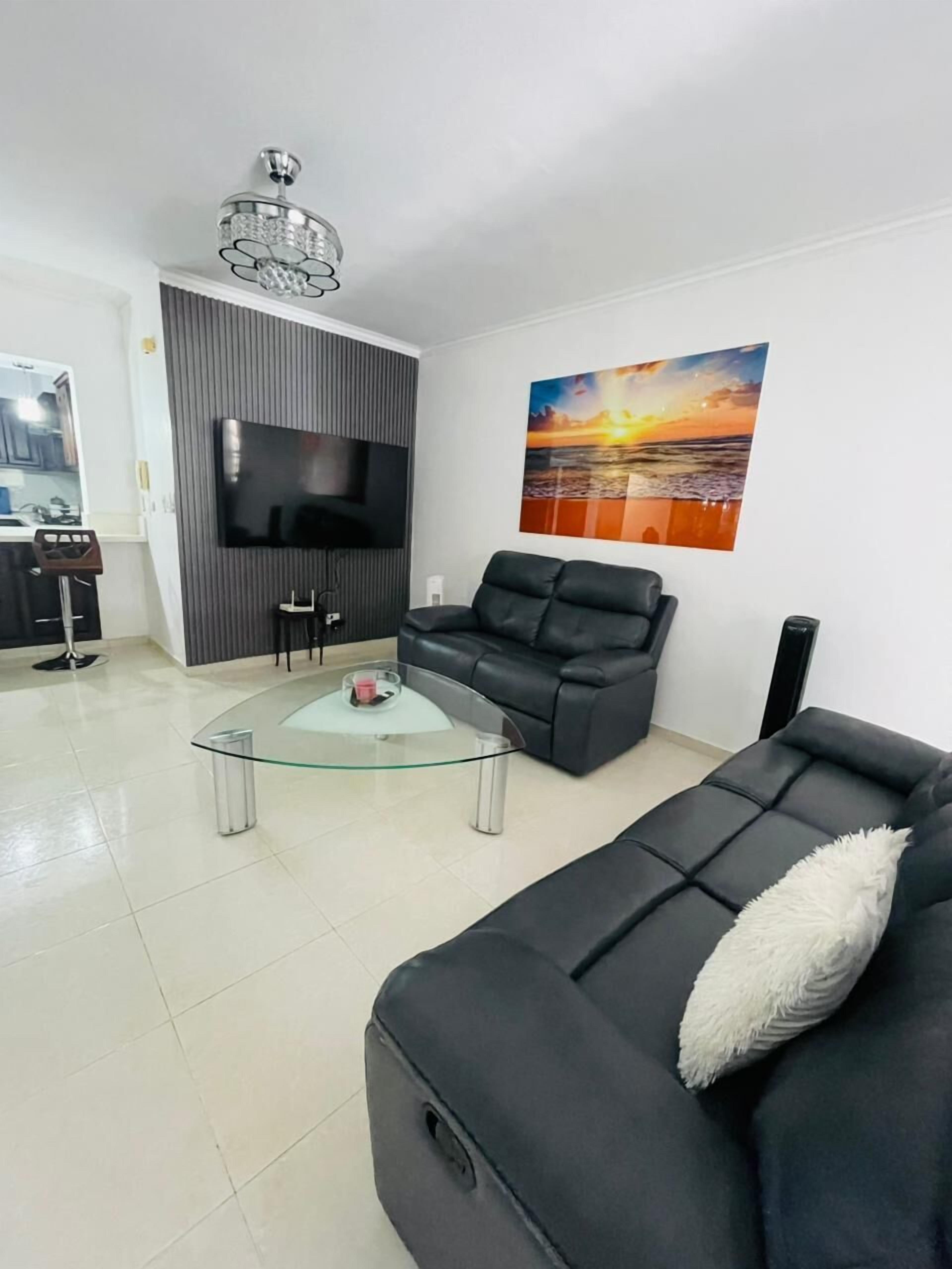 Apartment, Balcony | Living area | 52-inch TV with digital channels, Netflix, streaming services