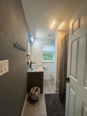 Shower, towels, soap, toilet paper