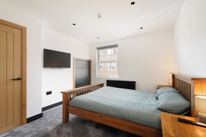 2 dormitorios, tabla de planchar con plancha, Internet y ropa de cama