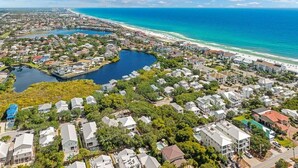 A coastal residential area with houses, a marina, and a beach. - New Coastal Retreat | Spa & Pool + Beach Access (Destin)