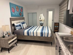 1 habitación, tabla de planchar con plancha, wifi y ropa de cama 