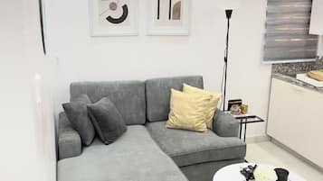 Luxury-Apartment, Stadtblick | Wohnbereich