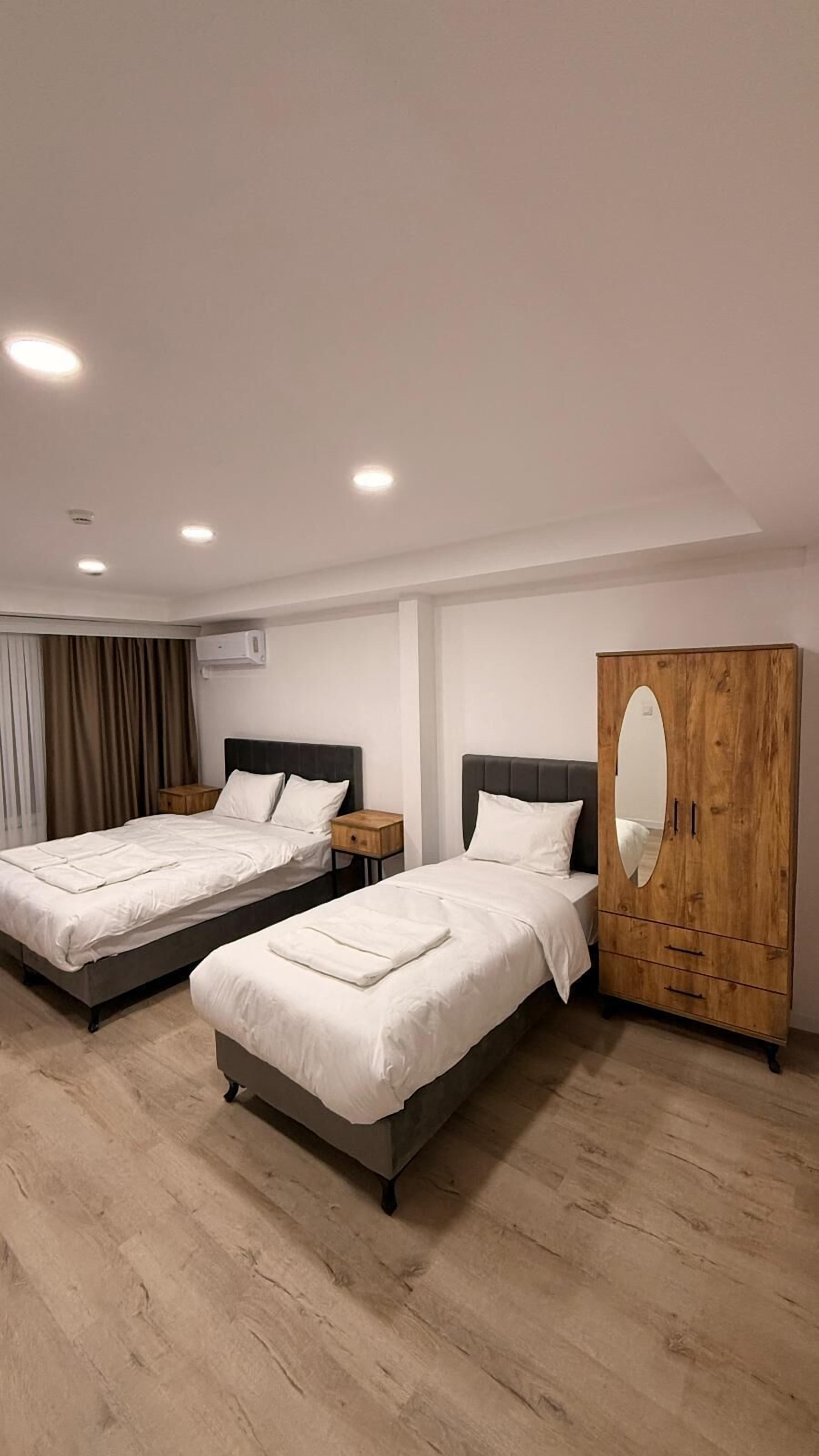 Triple Room, Sea View | Desk, laptop workspace, free WiFi