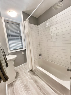 Eco-friendly toiletries, hair dryer, towels, soap