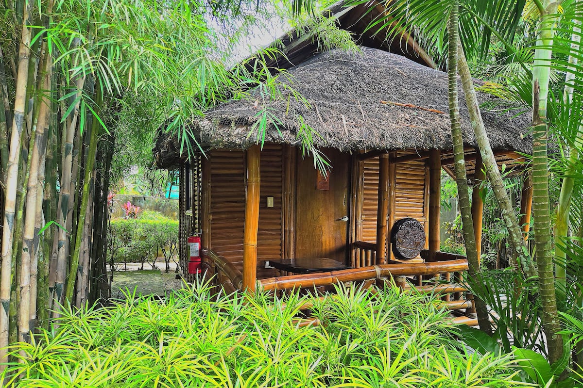 Deluxe Bungalow, Balcony, Garden View | Iron/ironing board, free WiFi
