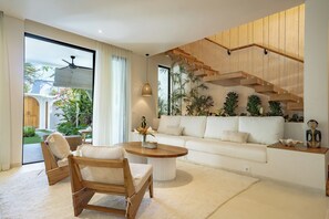 Luxury Villa, 3 Bedrooms, Patio, Pool View | Living room | 55-inch Smart TV with cable channels - Kayana Villa Uluwatu (Pecatu)