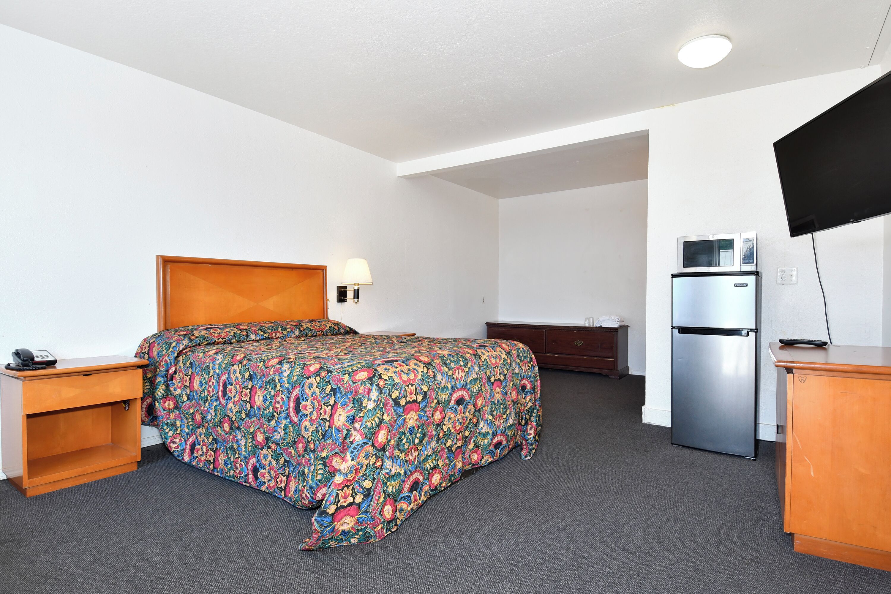 Quarto solteiro, 1 cama Queen | Área de estar