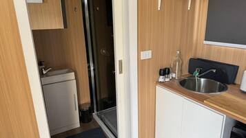 Dutxa, assecador de cabells i tovalloles