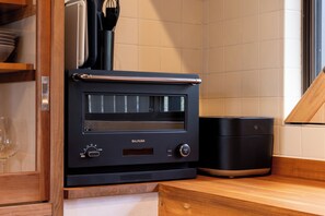 Fridge, microwave, oven, cookware/dishes/utensils