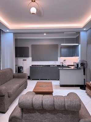 Appartement Confort, balcon, vue ville | Coin séjour