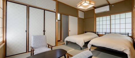 2 slaapkamers, een strijkplank/strijkijzer, gratis wifi, beddengoed