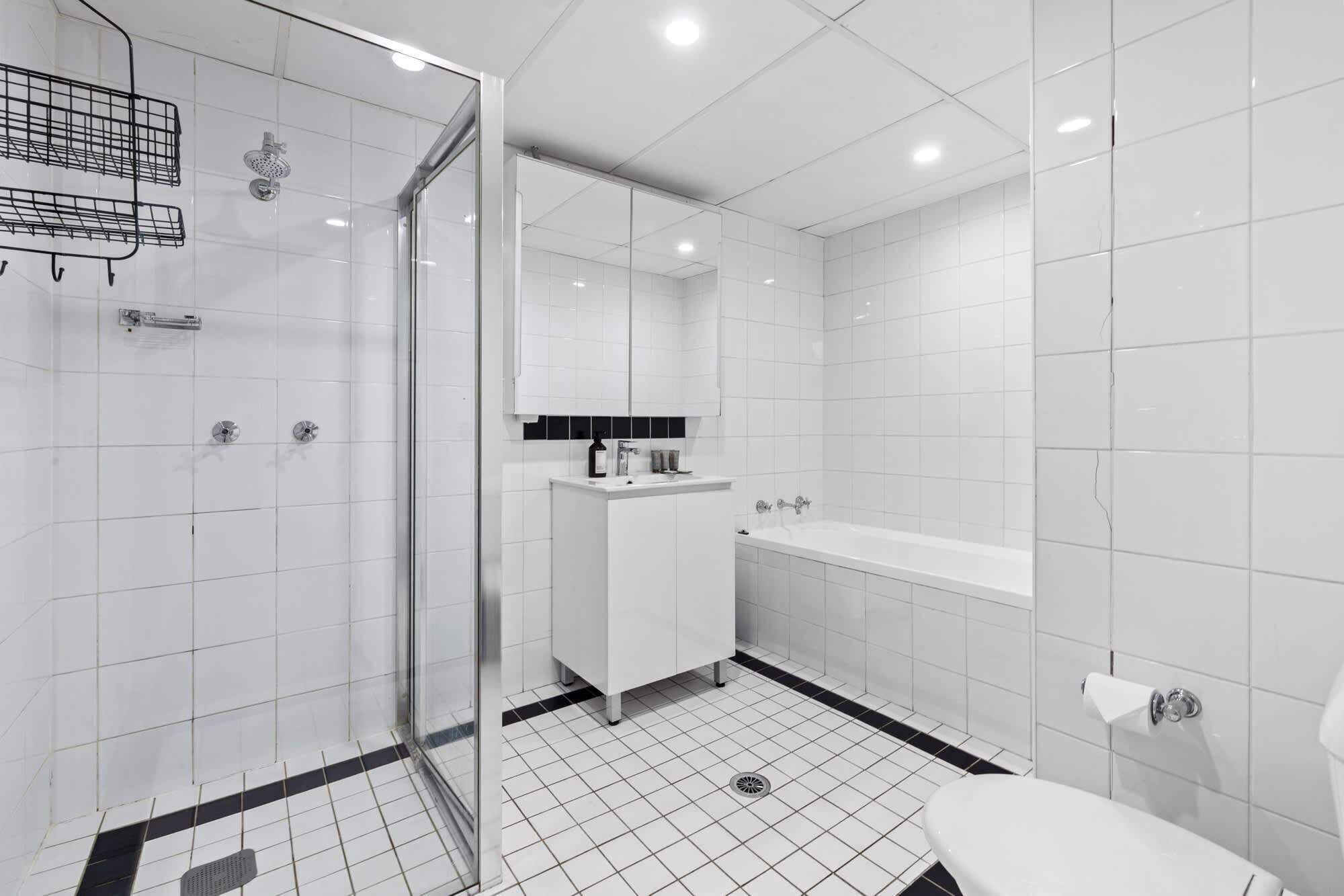 Shower, hair dryer, towels, shampoo