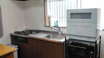 Fridge, microwave, stovetop, cookware/dishes/utensils