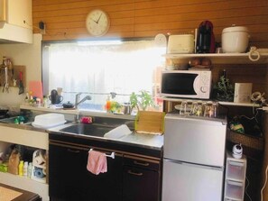 Fridge, microwave, stovetop, cookware/dishes/utensils