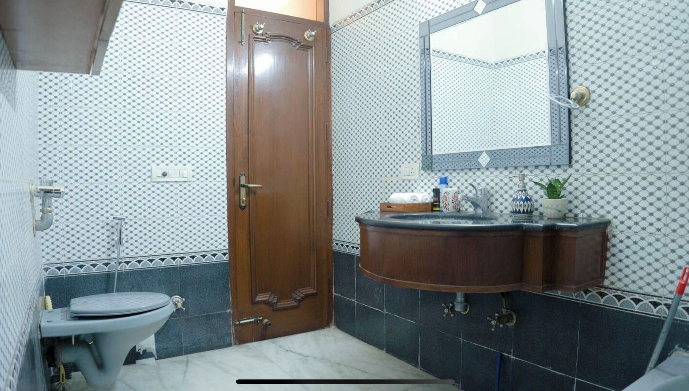 Bidet, towels, soap, toilet paper