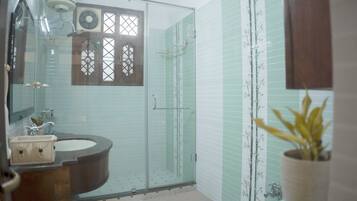 Bidet, towels, soap, toilet paper