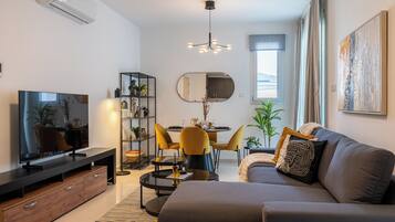 Apartment, 2 Bedrooms, Kitchen, City View | Living room | 46-inch Smart TV with digital channels, streaming services