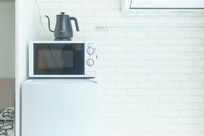 Apartament | Cuina privada | Frigorífic, microones i placa de cuina 