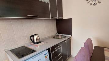 Fridge, stovetop, toaster, high chair