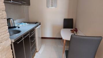 Fridge, stovetop, toaster, high chair