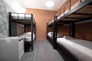 A dormitory room with bunk beds, a desk, and a small kitchenette. - Silver Gate Rooms-Diocletian's Palace - Six-Bed Room 2 (Split)