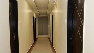 Habitación Deluxe doble, vistas a la ciudad | Zona de estar