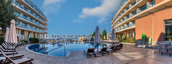 Seasonal outdoor pool, open 9:00 AM to 6:30 PM, pool umbrellas - Sandy bay hotel (Elenite)