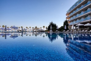 Seasonal outdoor pool, open 9:00 AM to 6:30 PM, pool umbrellas - Sandy bay hotel (Elenite)