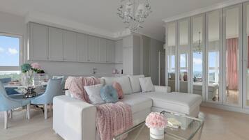 Deluxe Apartment, Hill View | Living area | 35-inch flat-screen TV with satellite channels