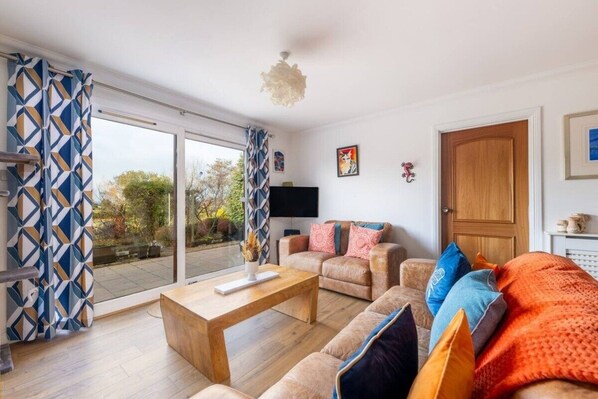 TV, fireplace - Lochnomore - A Luxury Home With Magnificent Views (Highland Council)