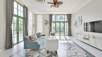 Executive Villa | Living area | Flat-screen TV