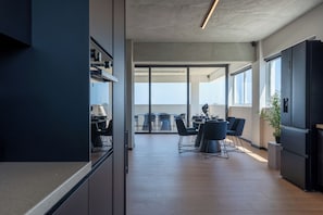 Apartment, 3 Bedrooms, Balcony, Sea View | Private kitchen | Fridge, microwave, oven, stovetop