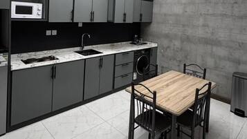 Mini-fridge, microwave, oven, stovetop