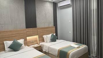 In-room safe, blackout curtains, soundproofing, iron/ironing board