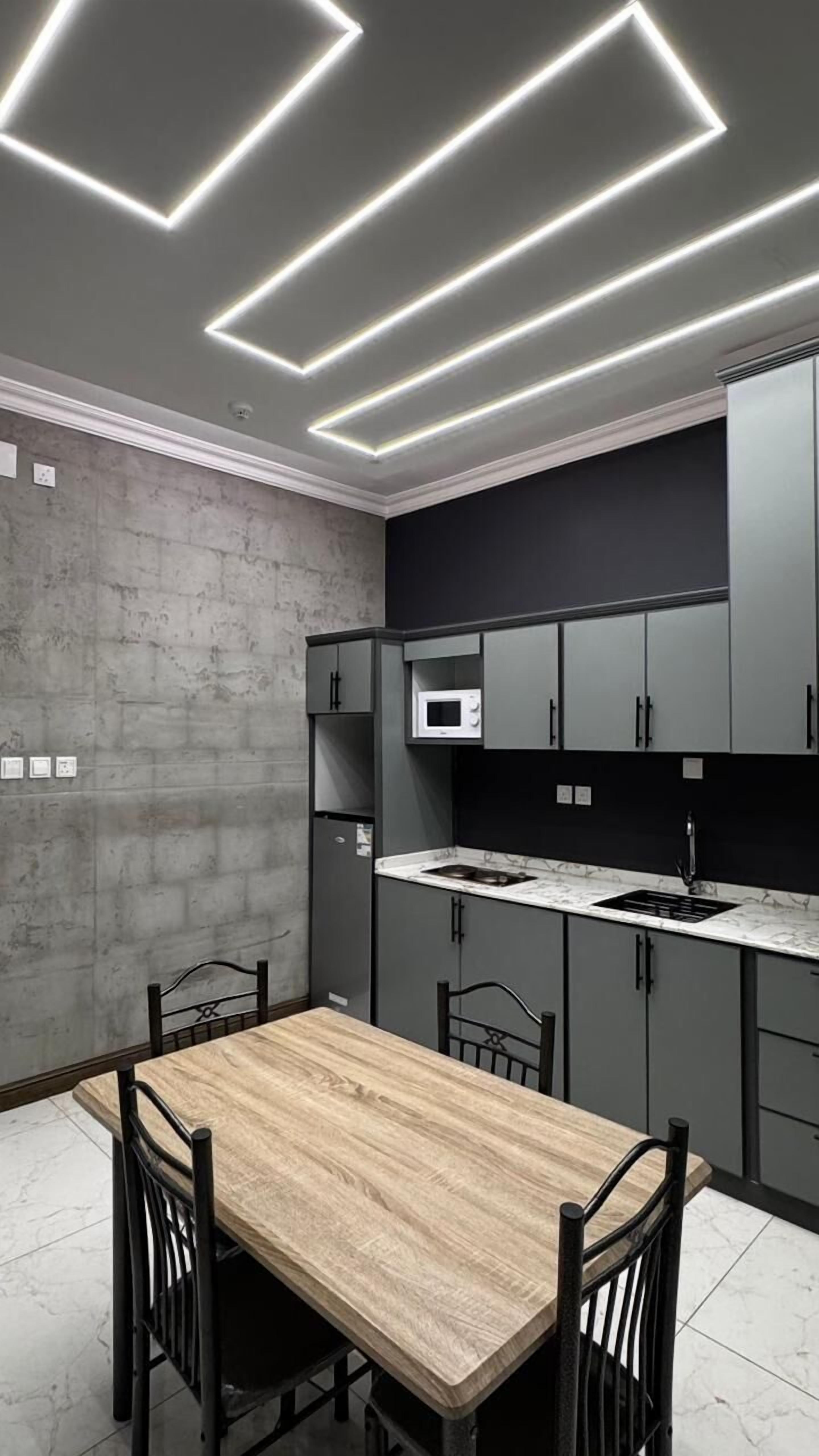 Mini-fridge, microwave, oven, stovetop