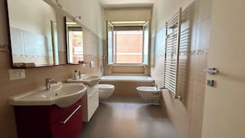 Shower, eco-friendly toiletries, hair dryer, bidet