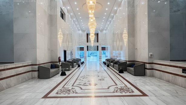 A spacious lobby with a grand chandelier, marble flooring, and seating areas. - Moro Alalameyah Hotel Makkah (Makkah)