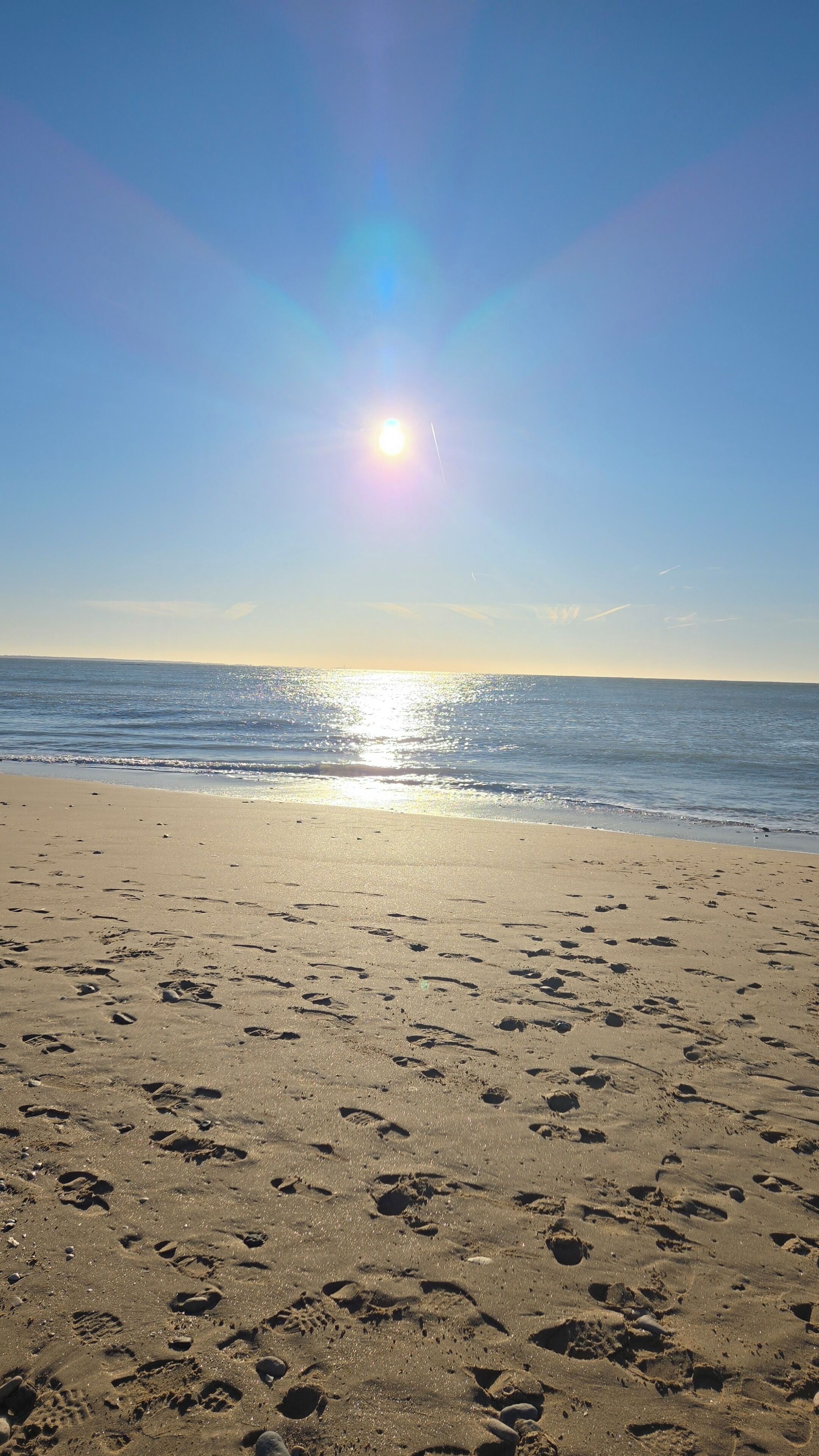 On the beach, sun loungers