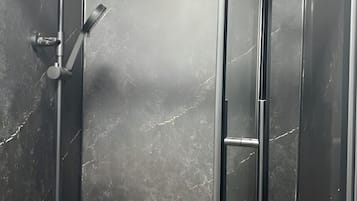 Shower, towels, soap, shampoo