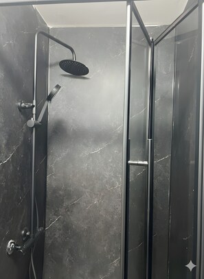 Shower, towels, soap, shampoo