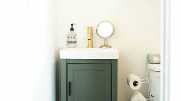 Hair dryer, towels, soap, shampoo