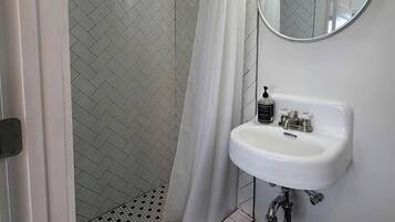 Hair dryer, towels, soap, shampoo