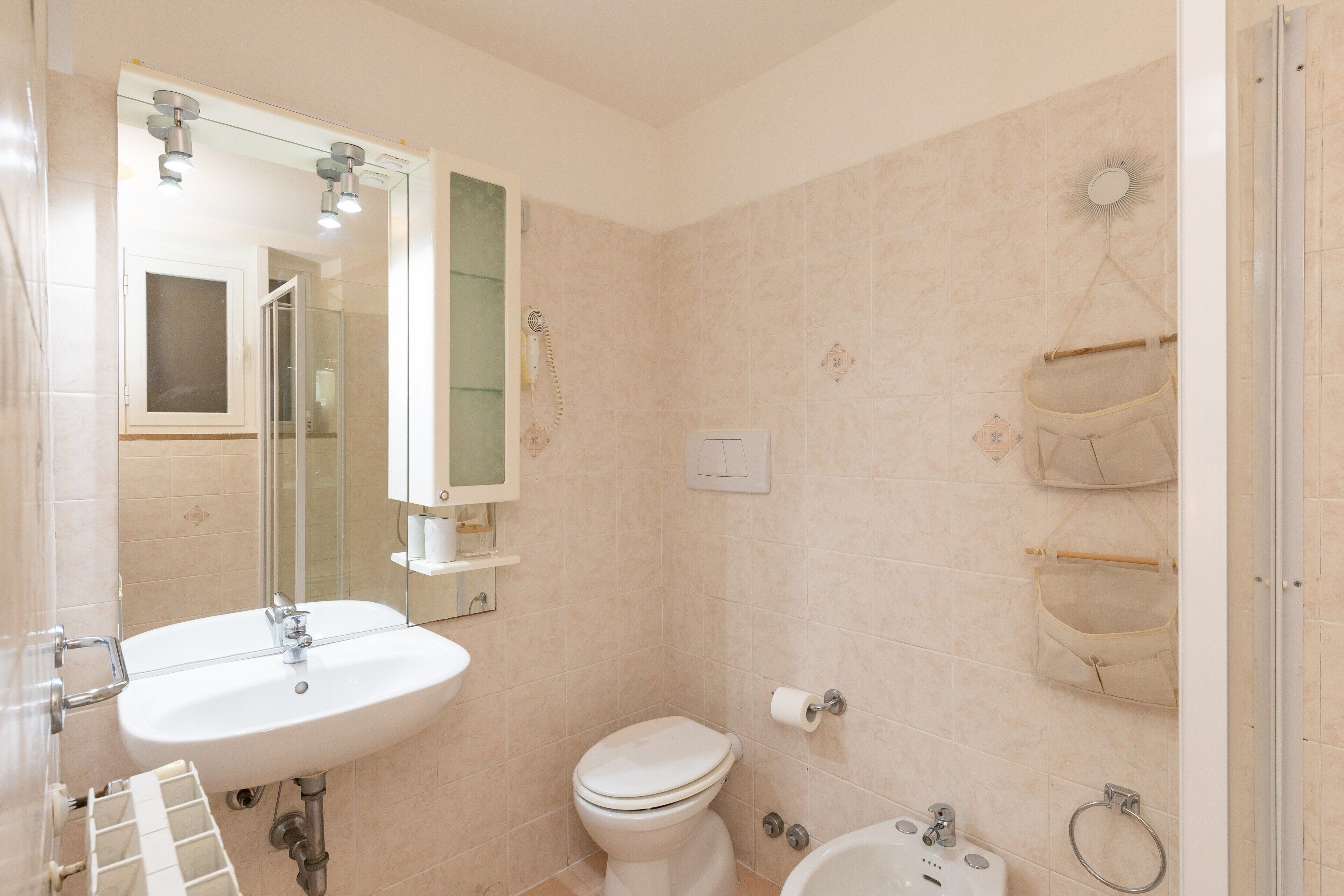 Shower, hair dryer, towels