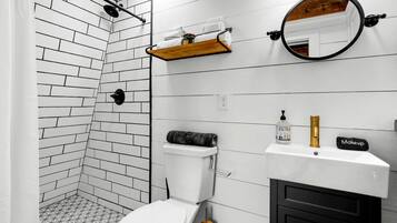 Hair dryer, towels, soap, shampoo